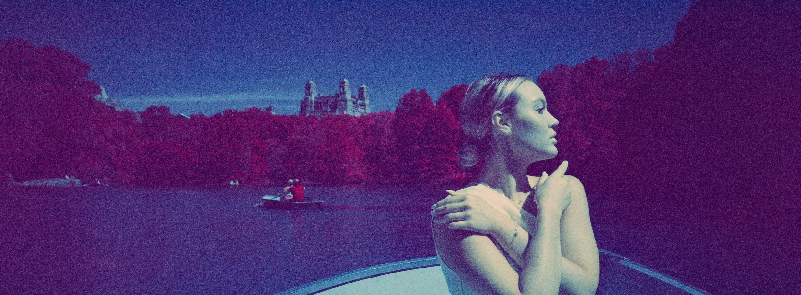A Woman in a rowboat on Central Park